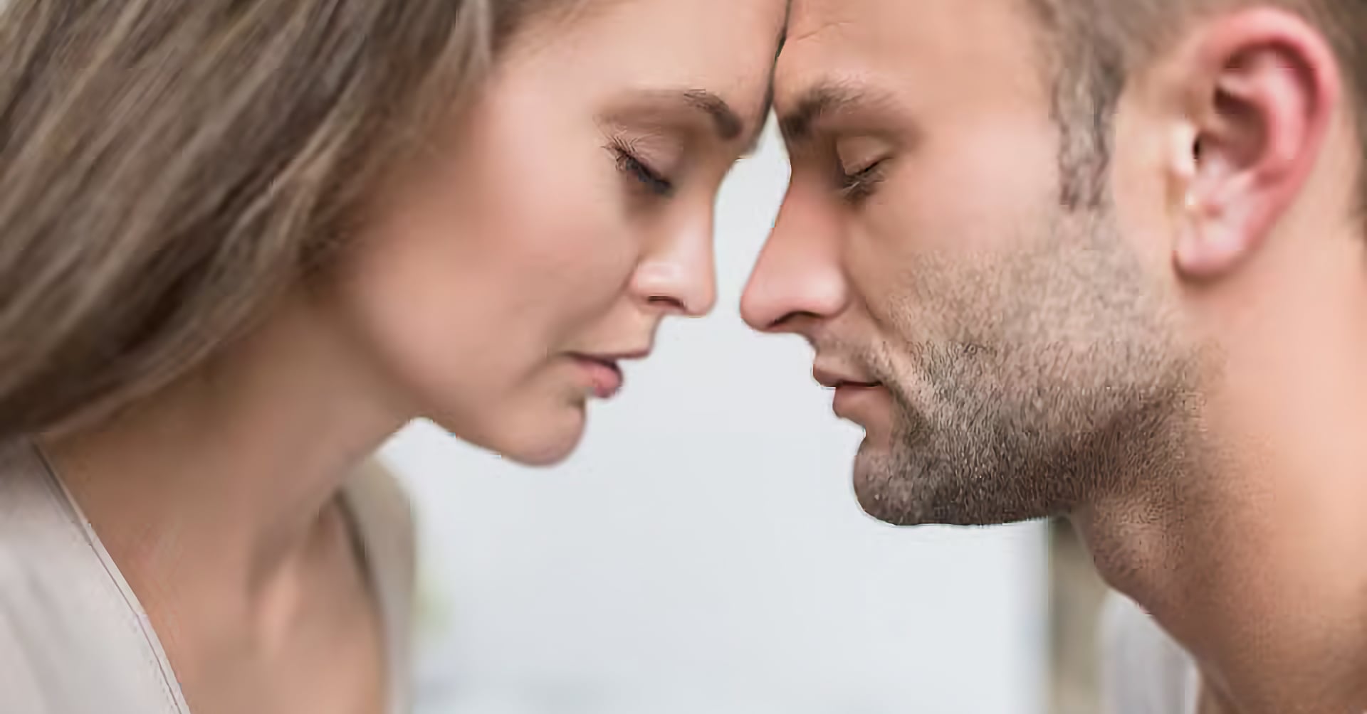young-attractive-couple-touching-foreheads-with-ey-2024-11-17-07-36-59-utc_d9xci